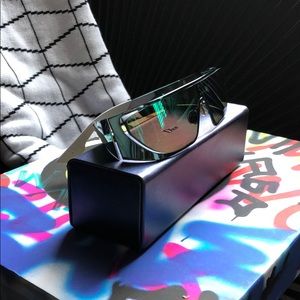 Dior x Rihanna collaboration. Blue tint sunglasses